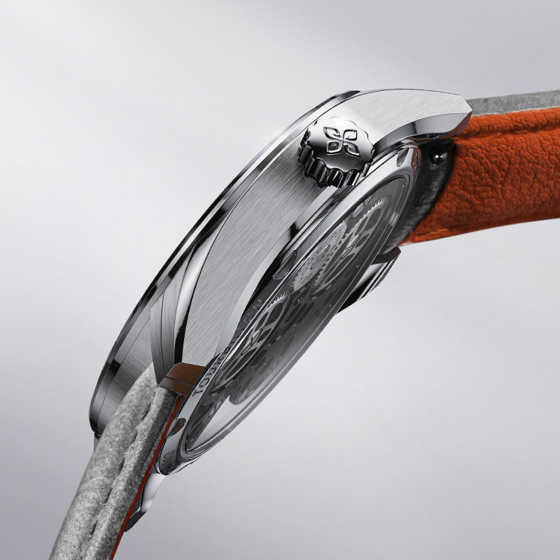 Side profile of Agelocer 3D-Manta flying tourbillon watch, polished silver case and orange leather strap