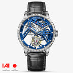 Agelocer free-sprung tourbillon watch, blue skeleton dial, diamond-set steel bezel, black leather strap, front