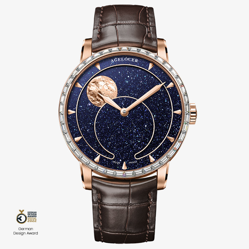 Agelocer Astronomer Moonphase rose gold diamond bezel watch on a brown leather strap, front view.