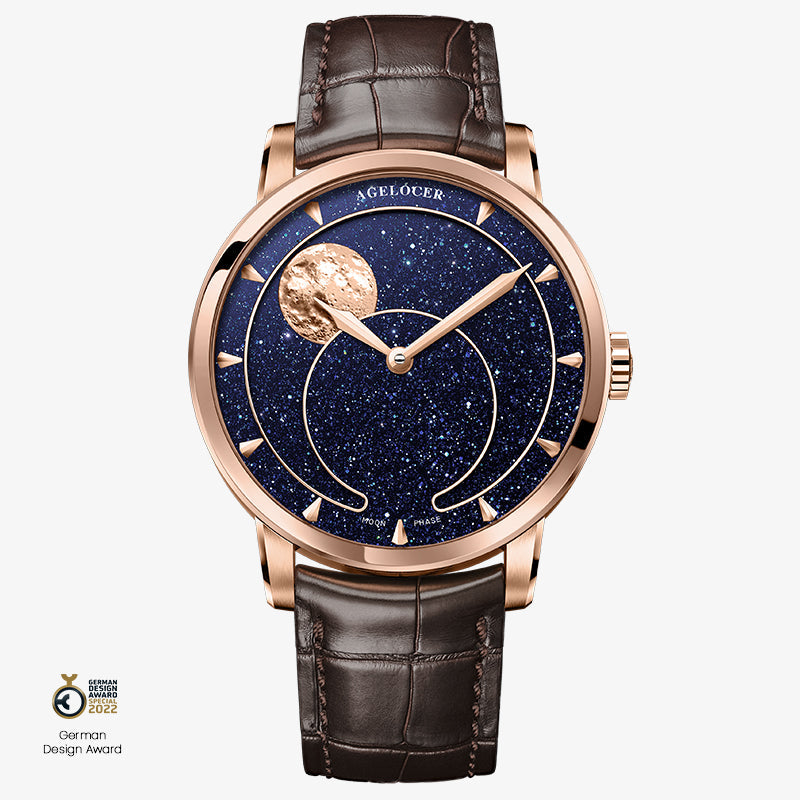 Agelocer Astronomer Moonphase in rose gold with aventurine moon dial on a brown leather strap, front view.