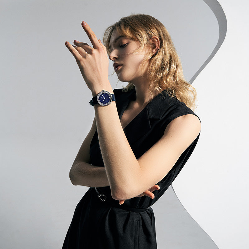 Female model wearing Agelocer Baikal Happy Diamond women's quartz watch, studio portrait lifestyle shot
