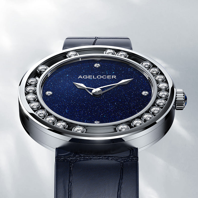 Agelocer Baikal steel watch tilted to show its navy aventurine dial and floating diamond ring