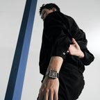 Male model wearing Agelocer Codex square skeleton automatic watch, studio lifestyle shot