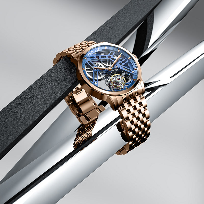 Agelocer Free-Sprung skeleton tourbillon watch with blue dial and rose gold case displayed at an angle, showcase