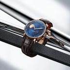 Agelocer Astronomer galaxy moonphase diamond watch with blue starry dial resting on polished steel bars, lifestyle