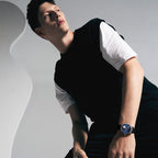 Male model wearing Agelocer Astronomer galaxy moonphase watch with blue starry dial, lifestyle shot