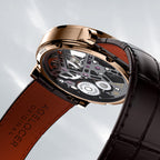 Side profile of Agelocer manual tourbillon watch showing skeleton movement and brown leather strap