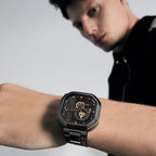 Man wearing Agelocer Racing Fast & Furious black steel skeleton watch on the wrist, close-up lifestyle