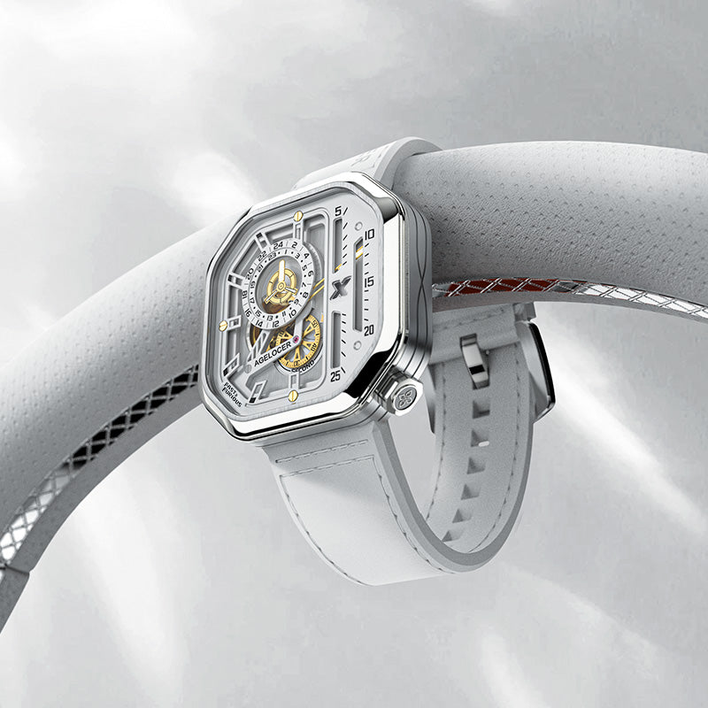 Agelocer Racing Fast & Furious women's white watch resting on a car steering wheel, racing lifestyle shot