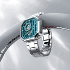 Agelocer Racing Fast & Furious women's teal watch resting on a car steering wheel, racing lifestyle shot