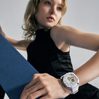 Woman wearing Agelocer Racing Fast & Furious white skeleton watch on the wrist, close-up lifestyle