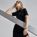 Woman wearing Agelocer Racing pink square automatic watch, studio lifestyle portrait