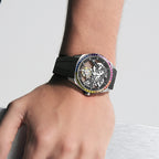 Agelocer Rainbow flying tourbillon watch with rainbow bezel worn on the wrist, close-up lifestyle shot