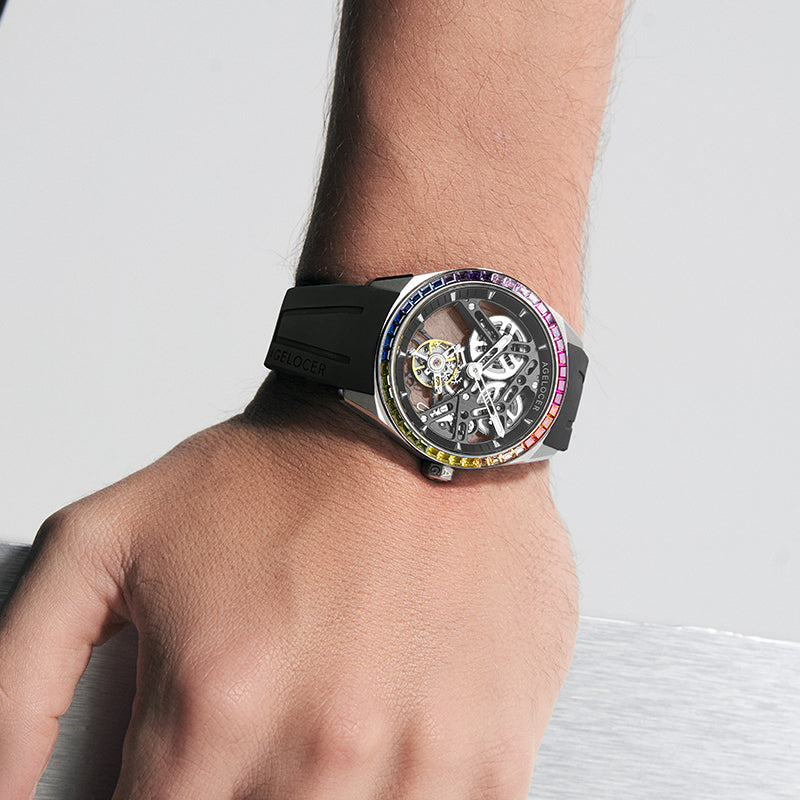 Agelocer Rainbow flying tourbillon watch with rainbow bezel worn on the wrist, close-up lifestyle shot