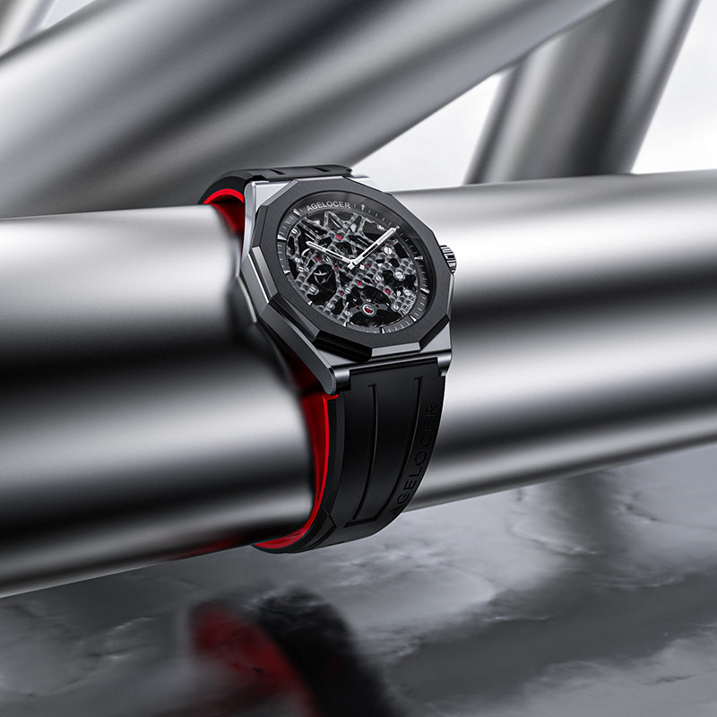 Agelocer Schwarzwald black skeleton automatic watch resting on brushed steel pipes, angled lifestyle shot
