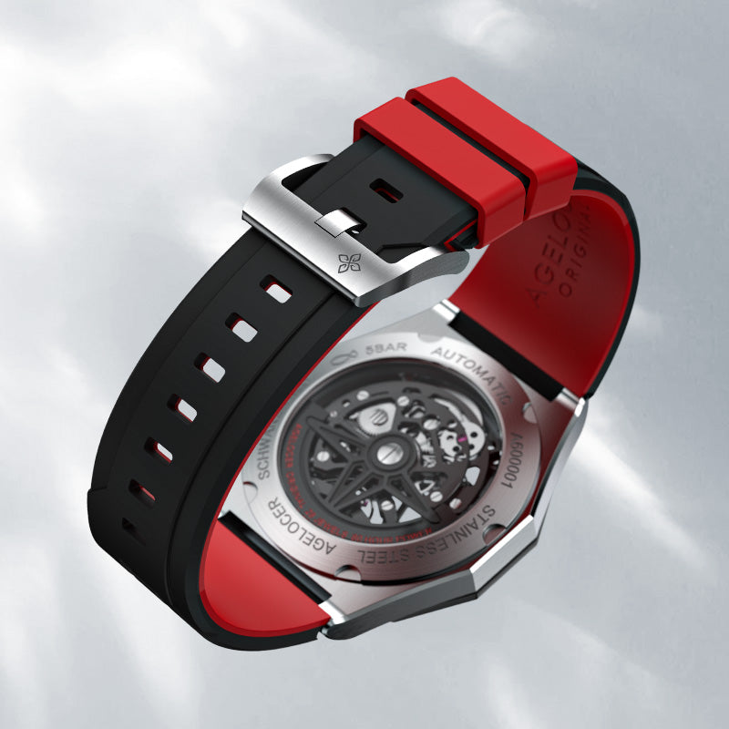 Agelocer Schwarzwald skeleton watch red and black rubber strap with signature logo buckle, close-up detail