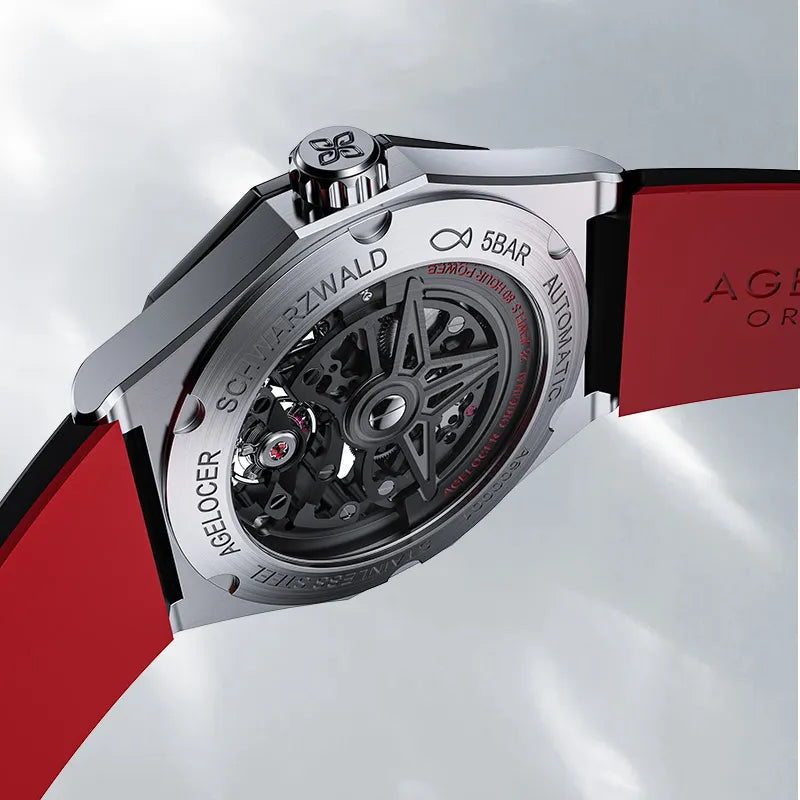 Caseback of Agelocer Schwarzwald automatic skeleton watch showing 5 BAR engraving, stainless steel case and red strap