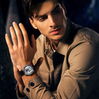 Male model in a tan shirt wearing the Agelocer Space Station automatic watch, studio lifestyle shot