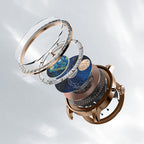 Exploded view of the Agelocer Astronomer painted moonphase watch showing dial discs, zircon bezel and movement