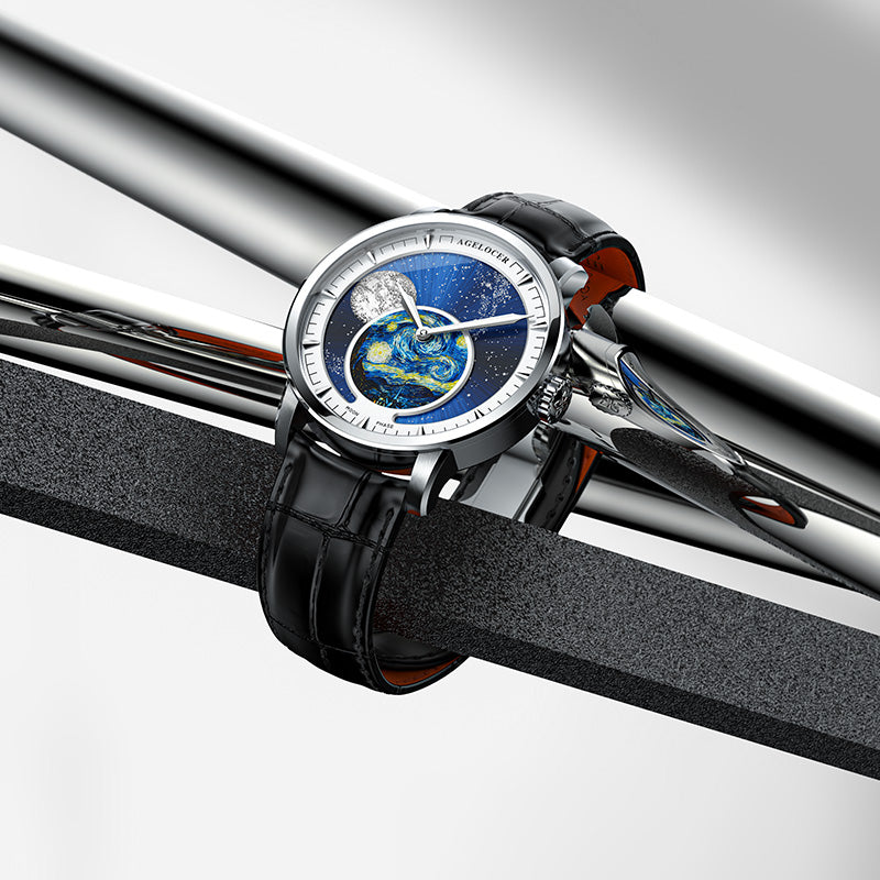 Agelocer Astronomer painted Starry Night moonphase watch resting on polished steel bars, lifestyle shot