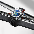 Agelocer Astronomer painted Starry Night moonphase watch resting on polished steel bars, lifestyle shot