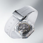 Agelocer Volcano crystal-case watch, transparent caseback and white strap detail