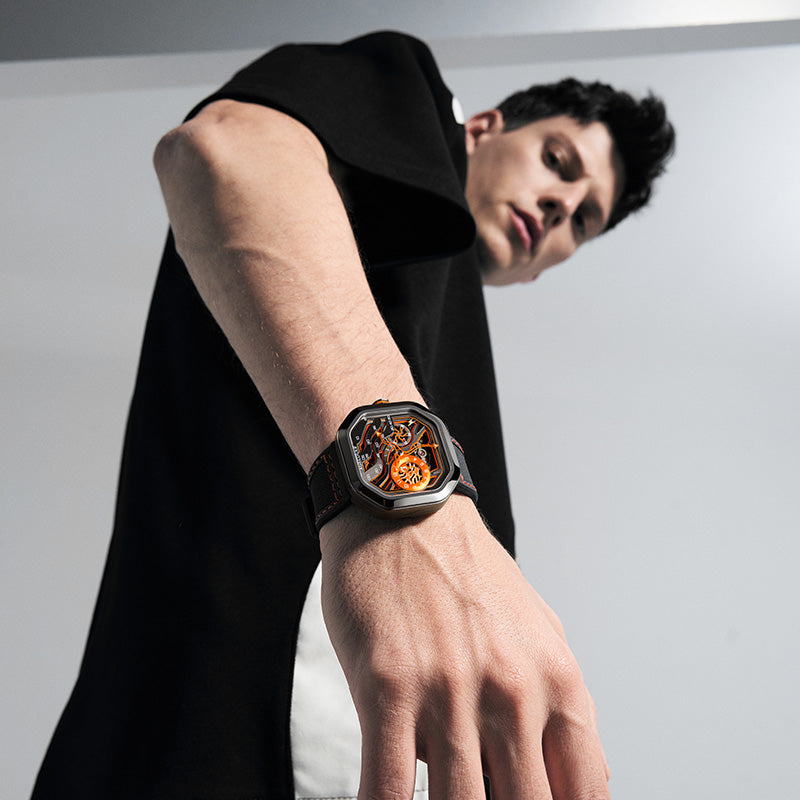 Man wearing Agelocer Volcano Flame orange watch, dynamic menswear lifestyle shot