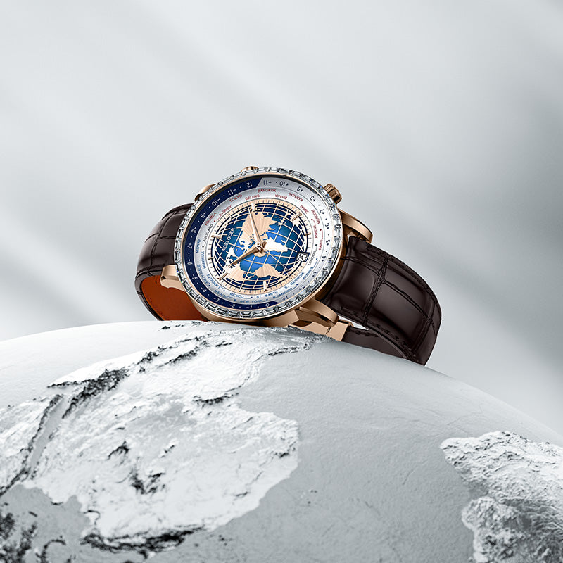 Agelocer World Time watch with blue globe dial resting on a white globe model, rose gold case, lifestyle