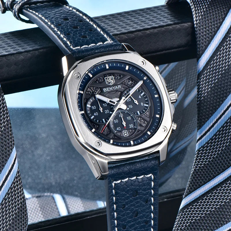 BENYAR BY-5222 retro quartz chronograph with blue skeleton dial and blue leather strap propped on tie