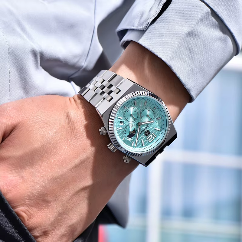 BENYAR BY-5225M honeycomb chronograph quartz watch with turquoise dial and steel bracelet worn on wrist