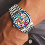 Ciloa painted dial watch tilted on wrist showing graffiti dial and steel bracelet