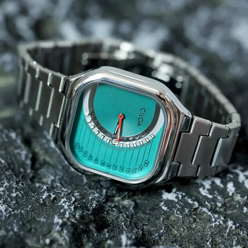 Ciloa retro square quartz watch turquoise gauge dial closeup detail with silver bracelet