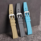 Fluororubber watch straps in khaki, grey and sky blue with silver pin buckles, comparison view