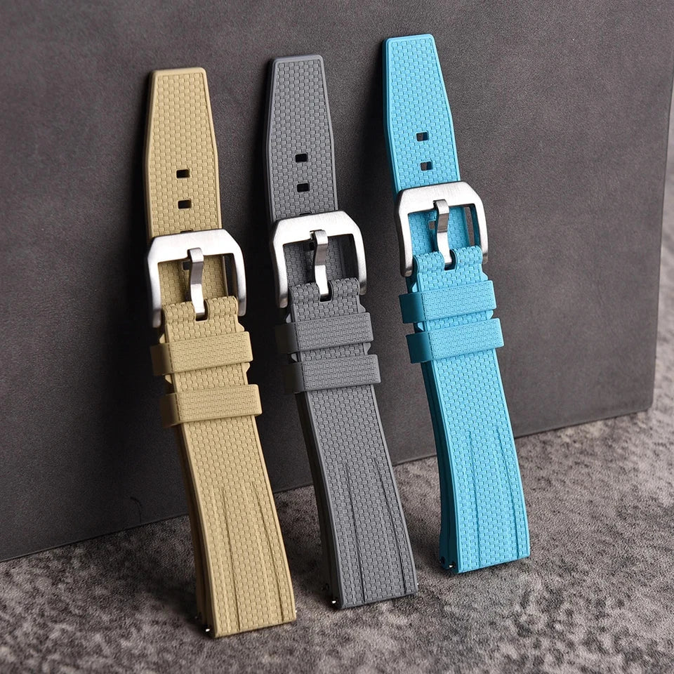 Fluororubber watch straps in khaki, grey and sky blue with silver pin buckles, comparison view