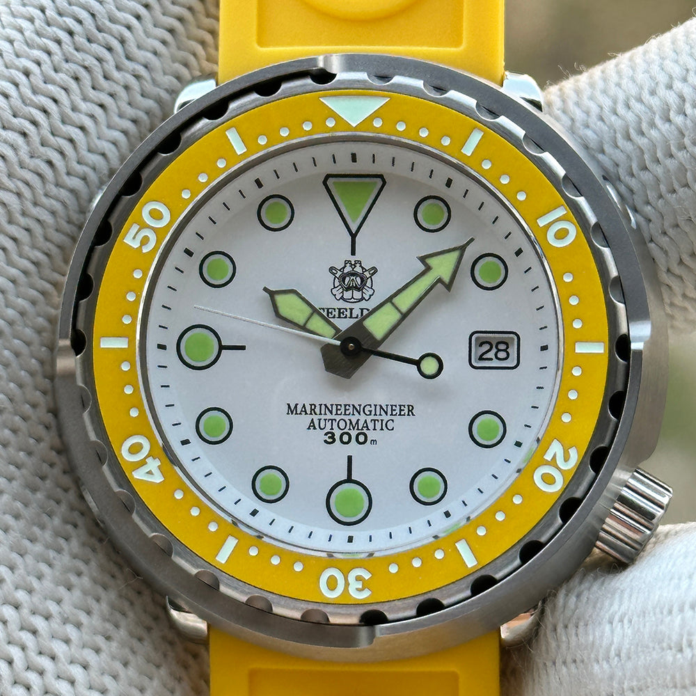 Front view of the STEELDIVE SD1975N white dial with yellow bezel on a yellow rubber strap