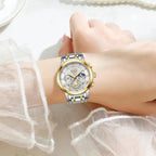 LIGE Luxury women's chronograph watch with white dial and two-tone steel bracelet on a woman's wrist