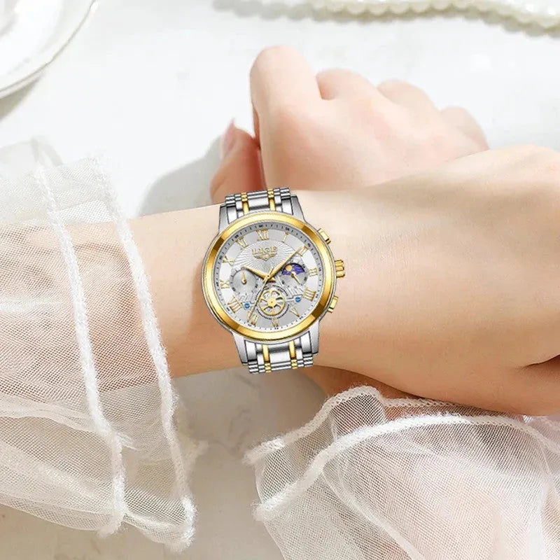 LIGE Luxury women's chronograph watch with white dial and two-tone steel bracelet on a woman's wrist