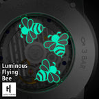 Lucky Harvey ZLS103-2 caseback with three luminous flying bees glowing green over the automatic movement