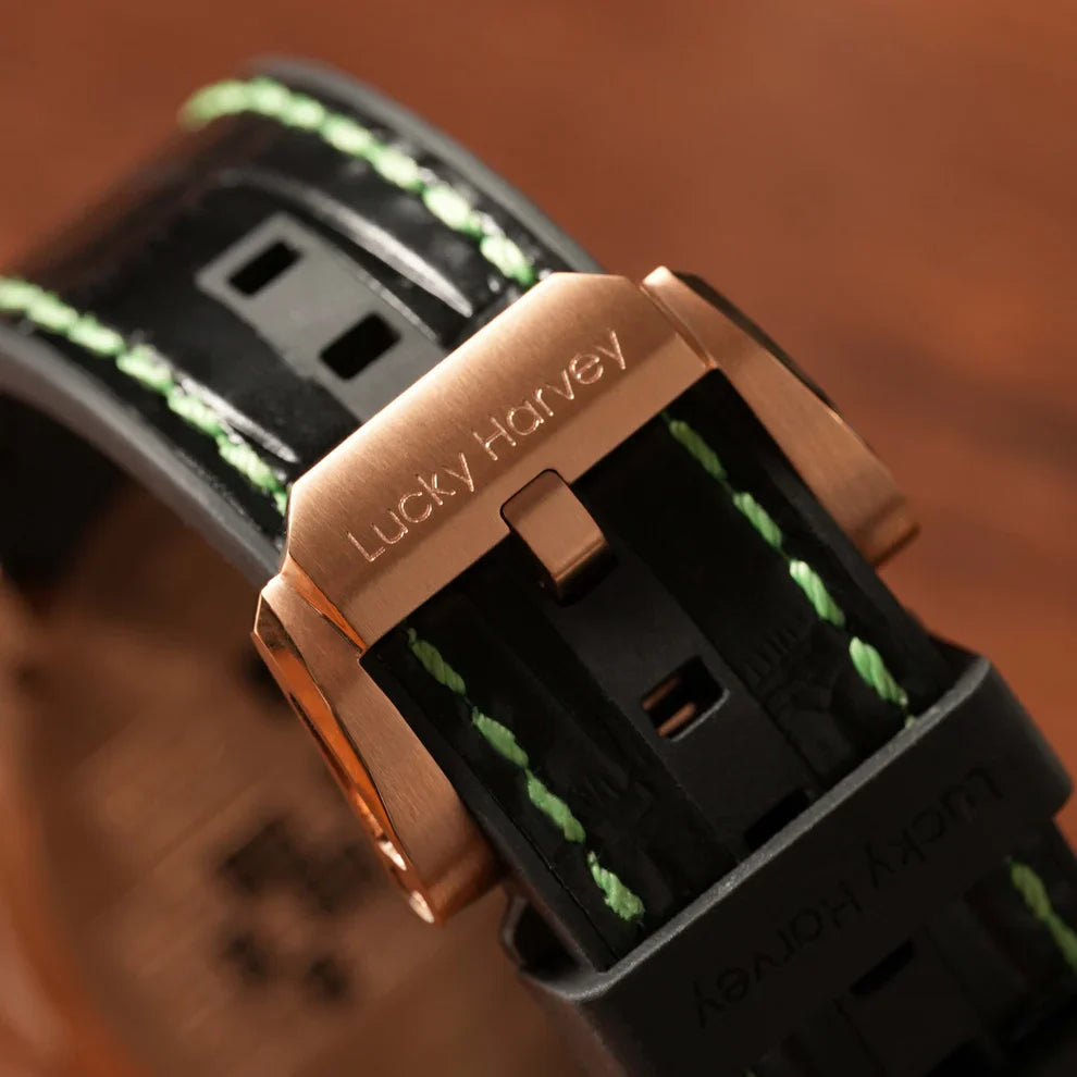 Lucky Harvey ZLS303-1 rose gold buckle clasp engraved with Lucky Harvey on green-stitched leather strap