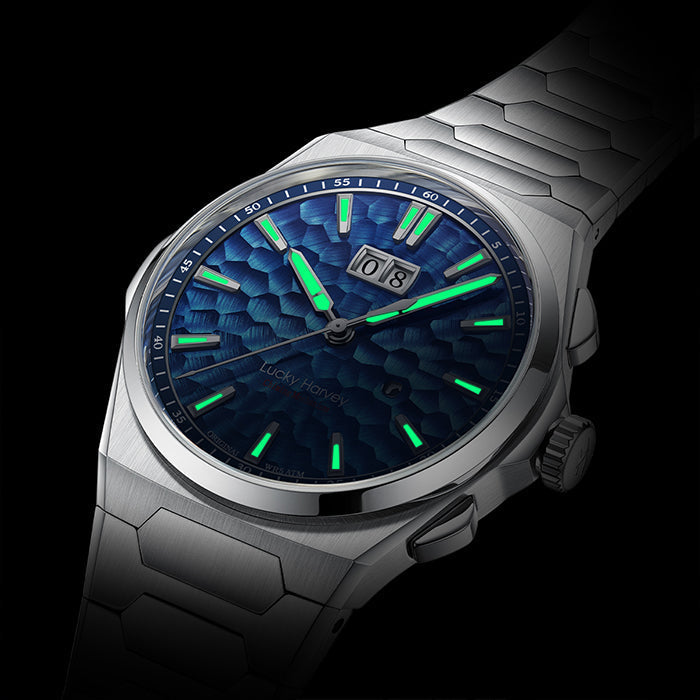 Lucky Harvey ZLS402-1 ocean blue chiming watch with green lume markers glowing in the dark