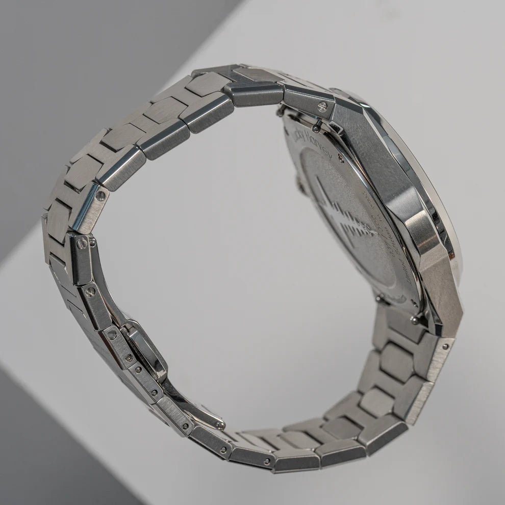 Lucky Harvey ZLS402-2 chiming automatic watch caseback and steel bracelet at angle