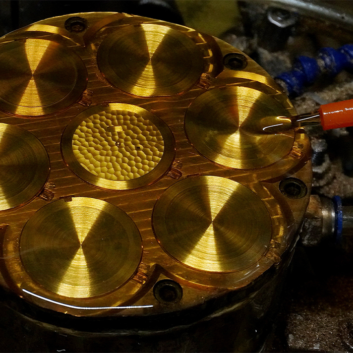 Lucky Harvey ZLS402-2 chiming gong components on brass machining fixture small thumbnail