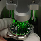 Lucky Harvey ZLS402-2 chiming watch under green lume charging machine glowing green