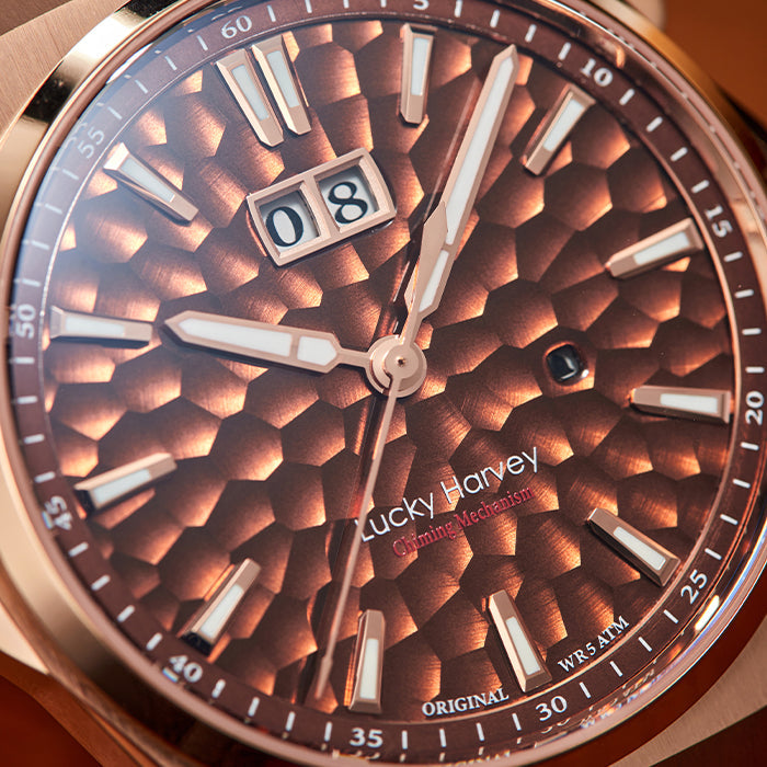 Lucky Harvey ZLS402-3 macro close-up of brown hammer-textured dial and big date window