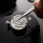 Lucky Harvey ZLS402-3 watchmaker fitting hairspring on chiming movement