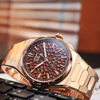 Lucky Harvey ZLS402-3 rose gold chiming watch in office lifestyle scene with keyboard