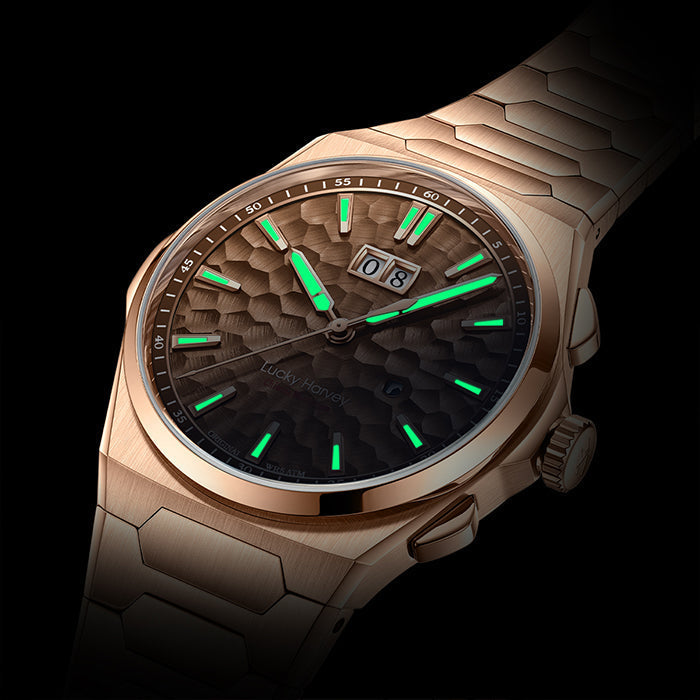 Lucky Harvey ZLS402-3 rose gold watch with green lume glowing in the dark