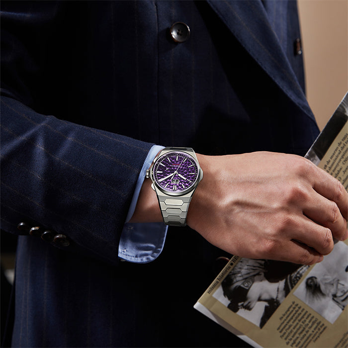 Lucky Harvey ZLS402-4 purple hammer chiming watch worn on wrist with navy suit