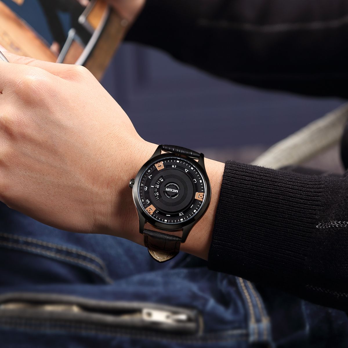 MEGIR 1067 men's watch on the wrist, black case with an industrial-style rose-gold-accented dial and black strap