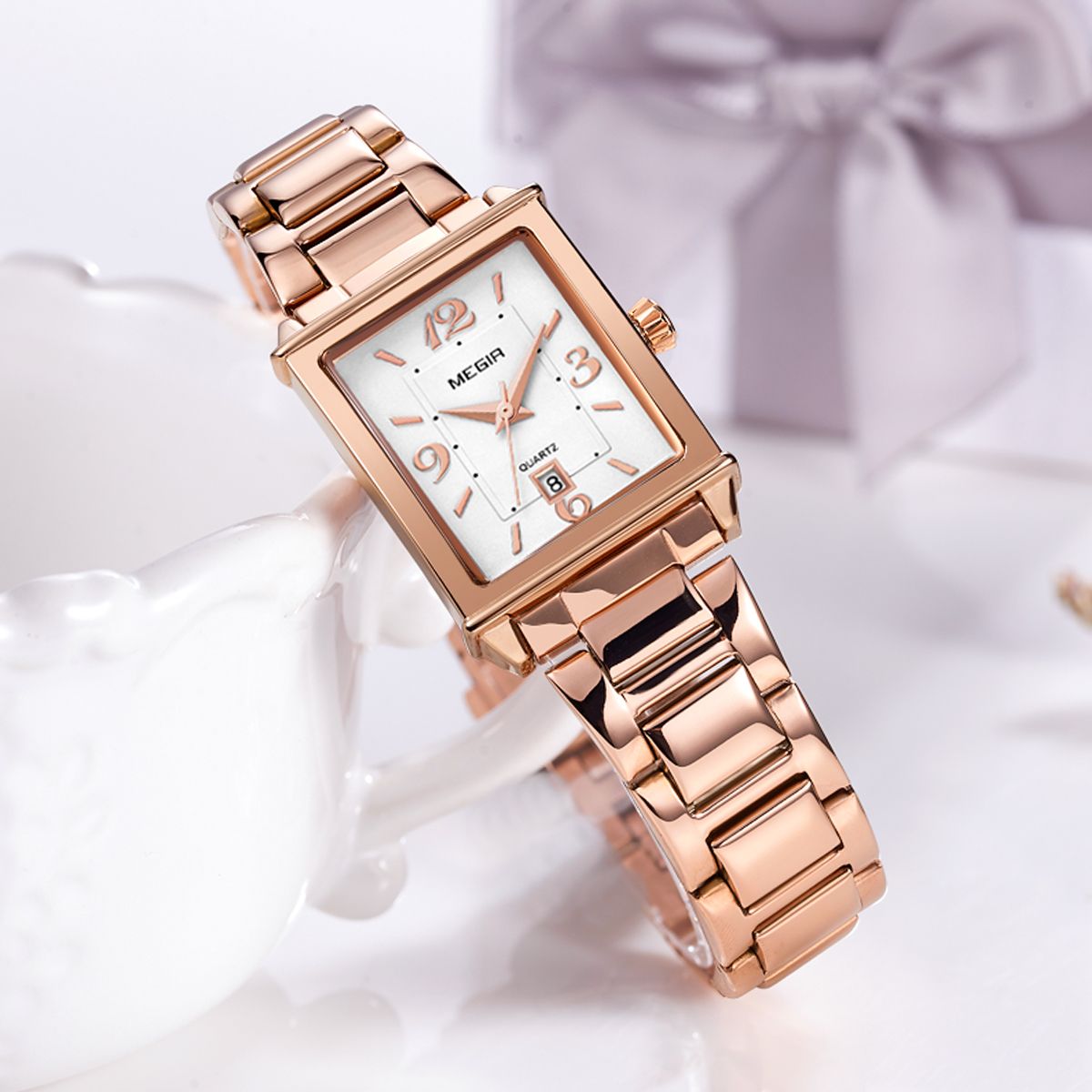 MEGIR 1079 women's watch, rose-gold rectangular case and bracelet with a white dial, angled view